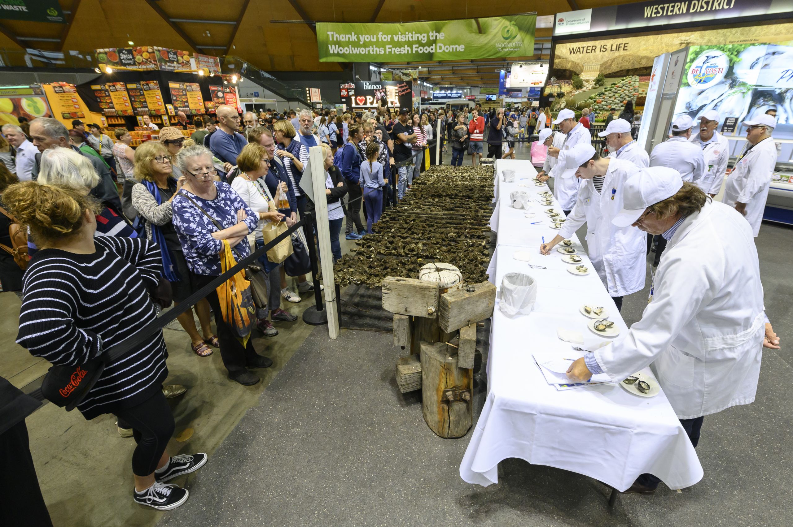 Show goers watch judges at the NSW Food Authority sponsored, Fine Food competition