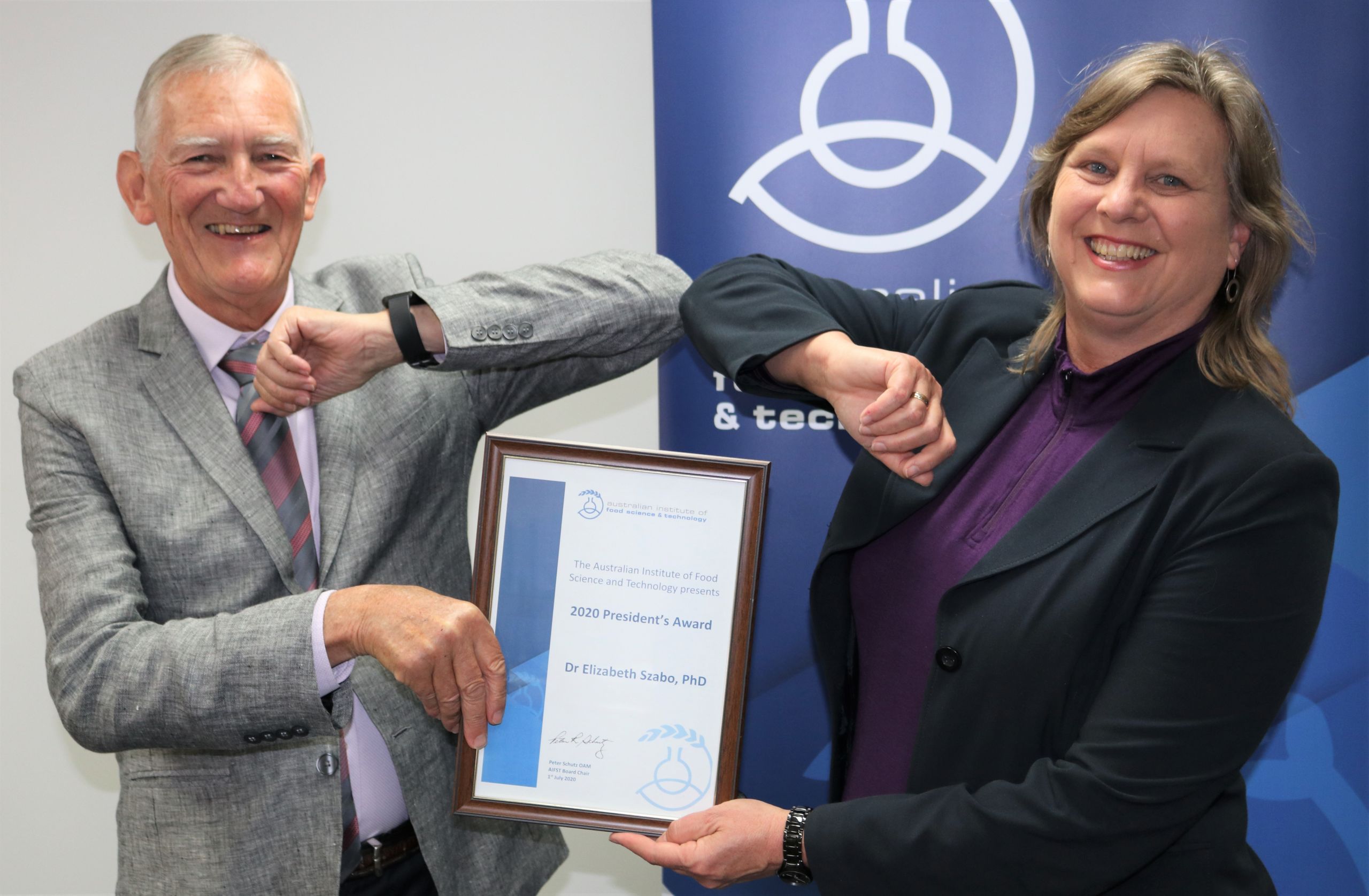 Image of Lisa Szabo accepting award