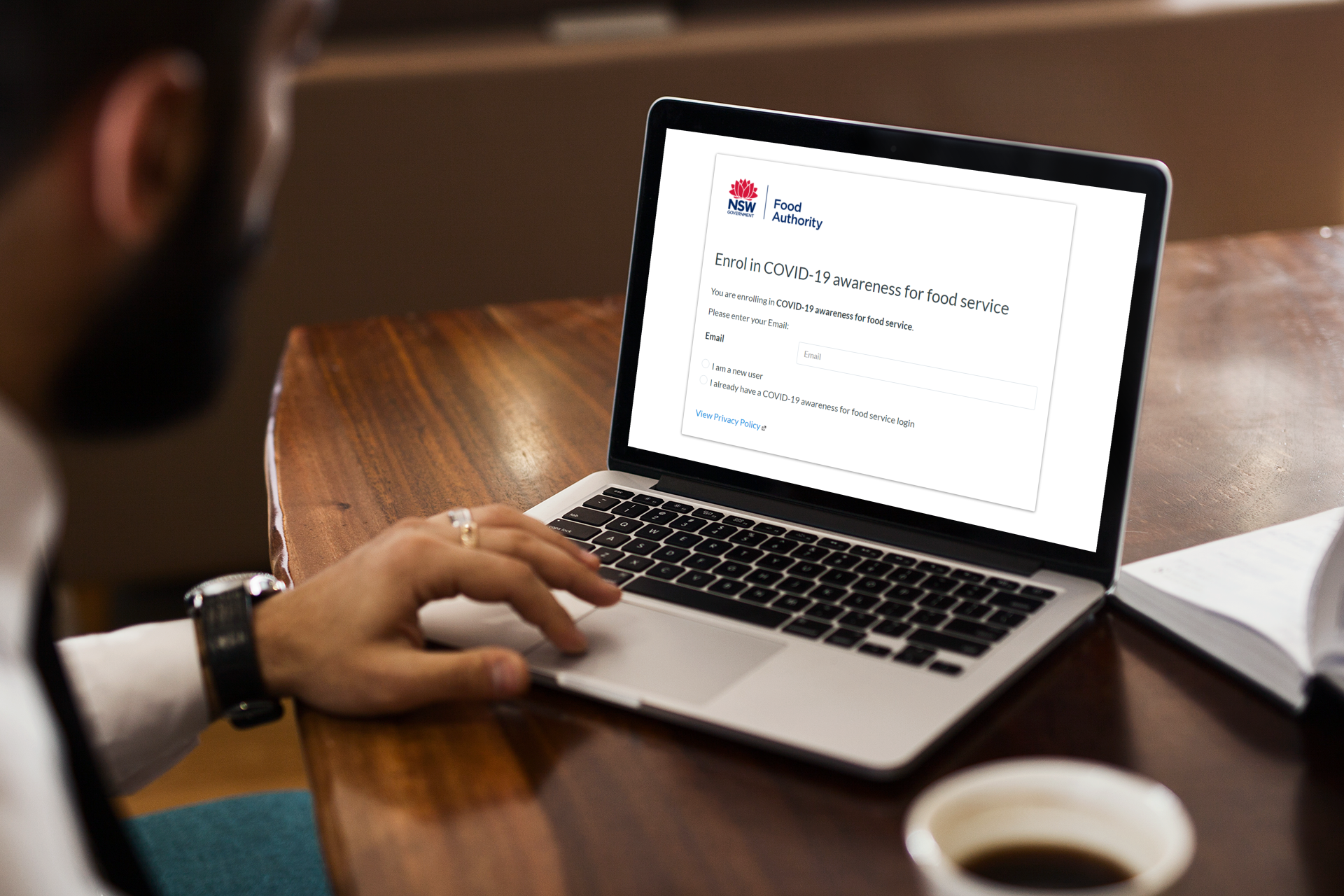 Image of person looking at training page