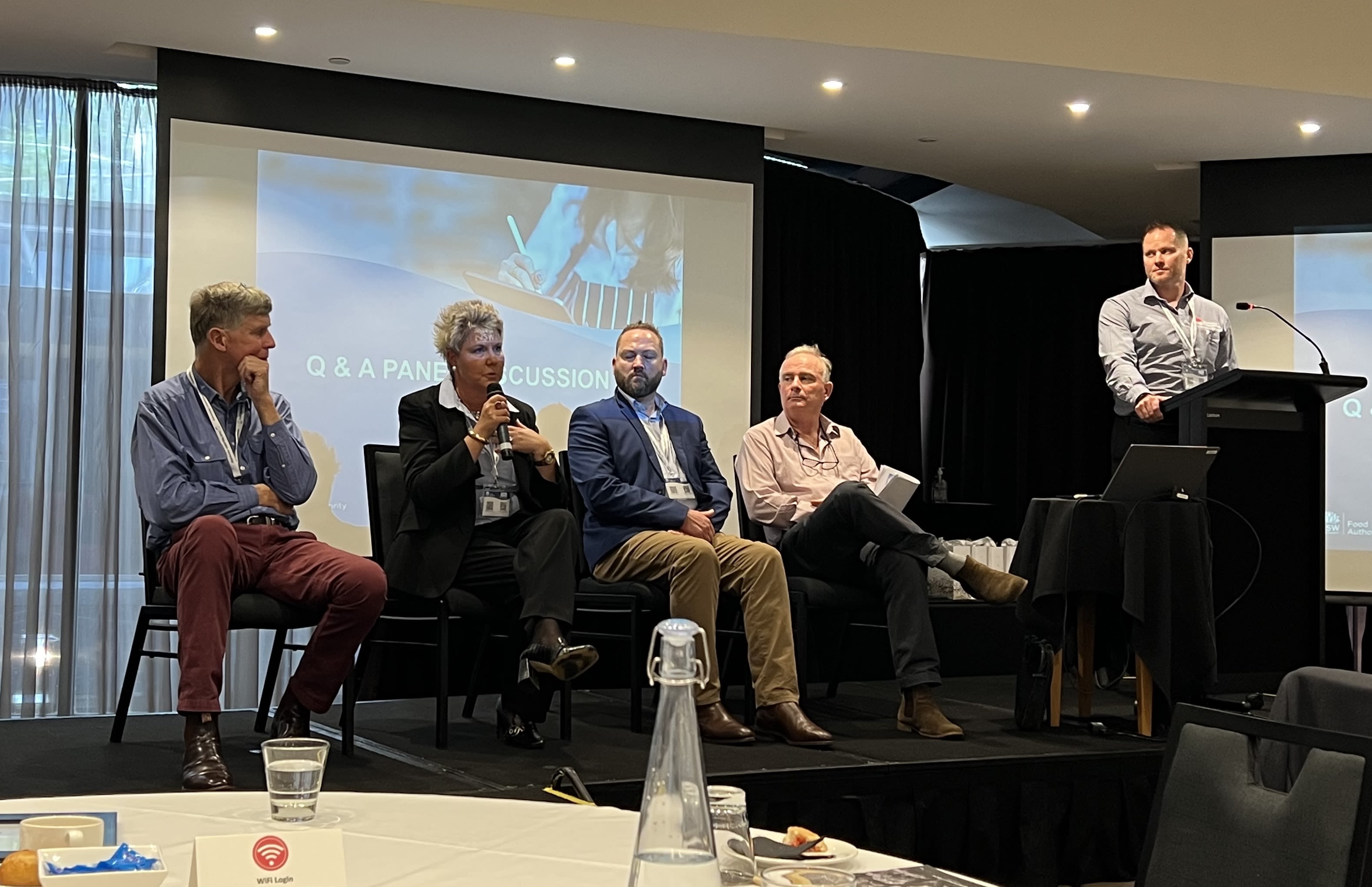 A panel of speakers answering further questions from attendees on their 'resilience under adversity' experiences