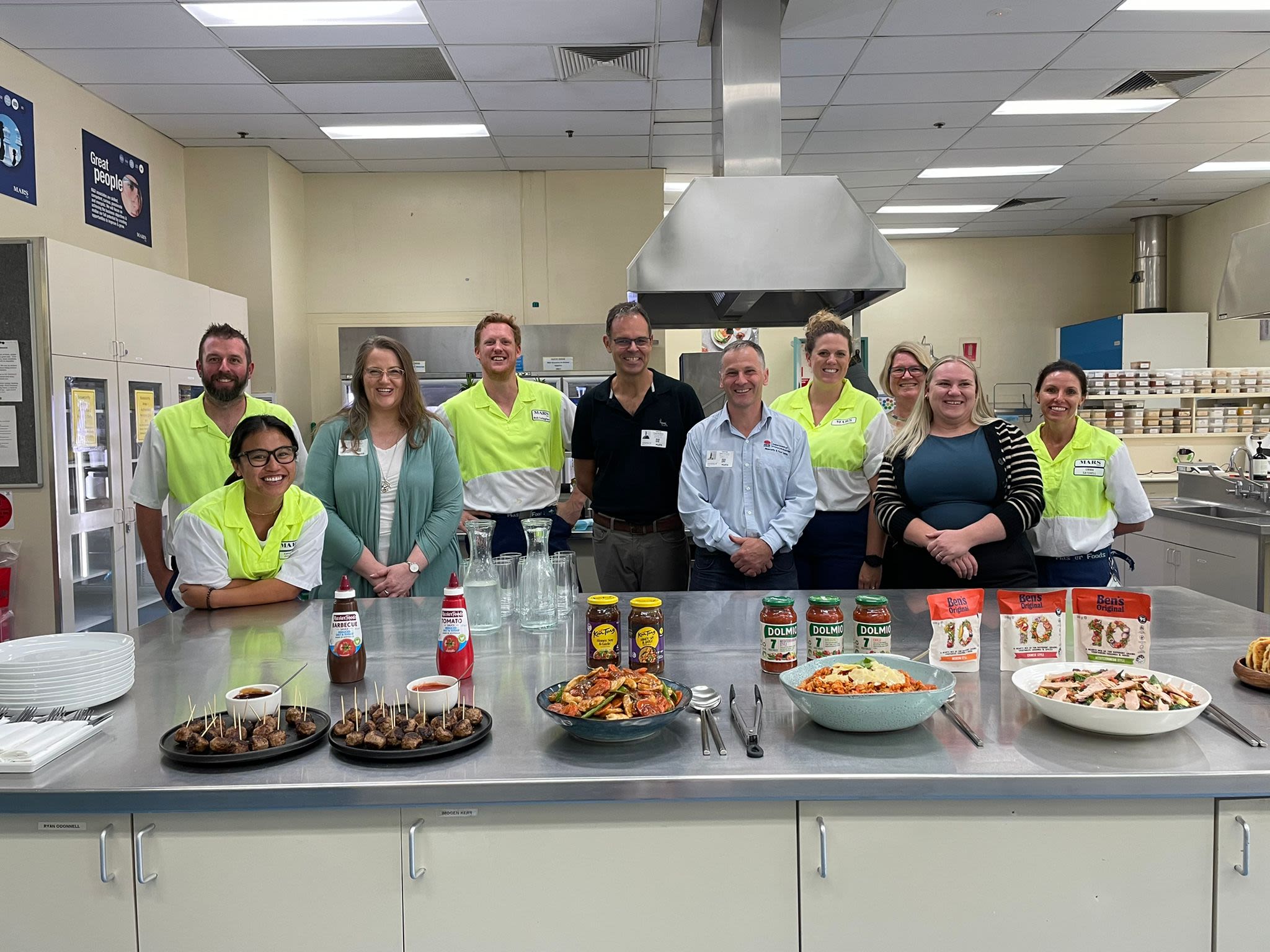 Food Authority and NSW Health representatives with staff from the Mars factory