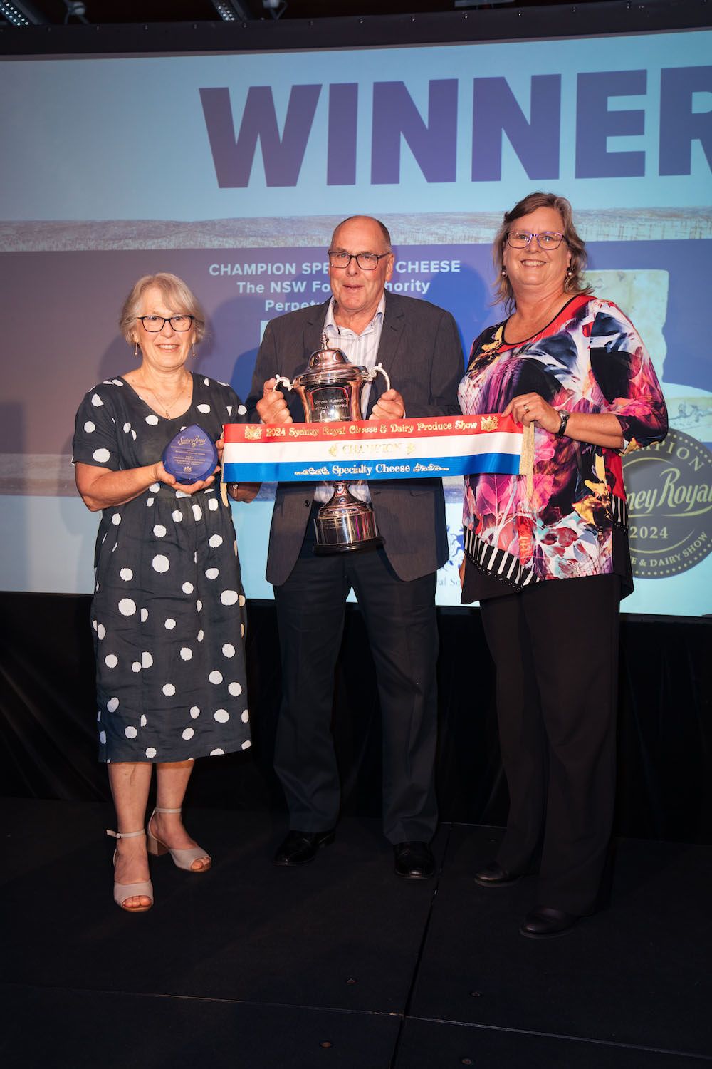 CEO NSW Food Authority Dr Lisa Szabo presents the perpetual trophy to the winners