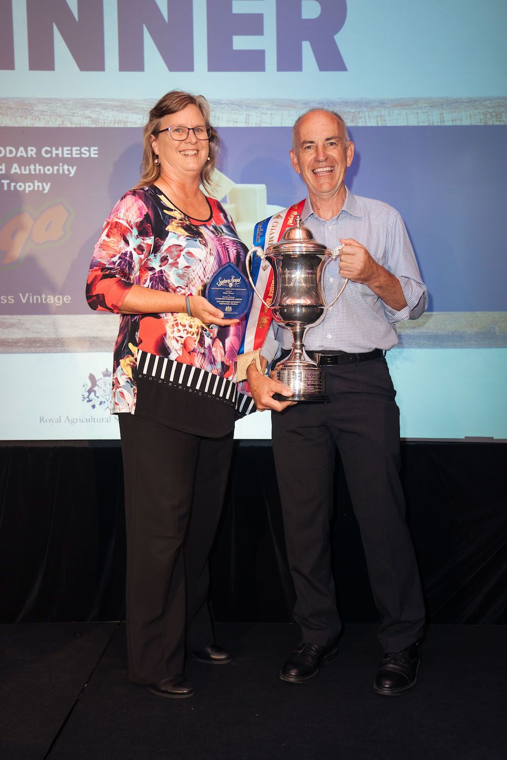 CEO NSW Food Authority Dr Lisa Szabo presents the perpetual trophy to the winners